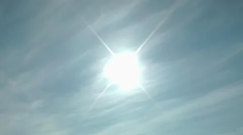 Wind in the summer, a strange kind of clouds and the sun, dandelion seeds fly Stock Footage 10700424