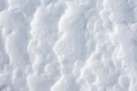 Wind sun weathered snow surface background pattern Foto stock
