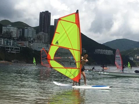 Wind surf beginner is attempting to survive at Hong Kong Stock Photos