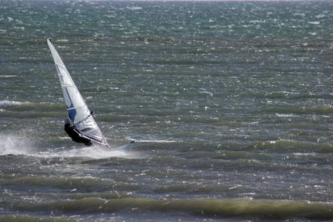 Wind surfer on ocean. Stock Photos