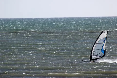 Wind surfer on ocean Stock Photos