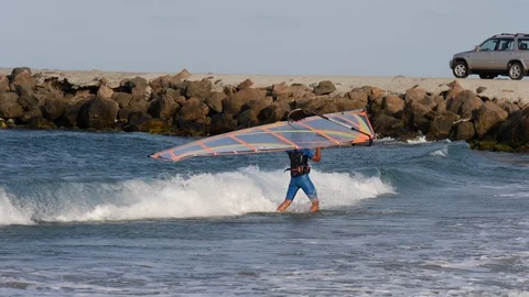 Wind Surfer Taking Surf Out Of The Water Stock Footage 119911867