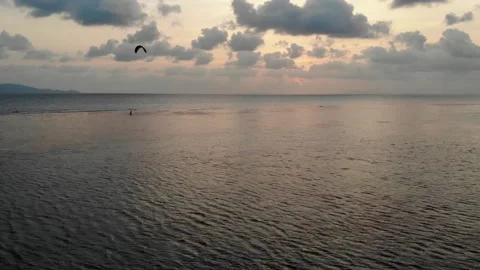 Wind Surfer In Thailand Riding Waves During Sunset Stock Footage 141474382