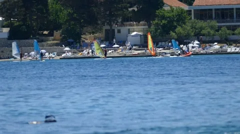 Wind Surfers close to Beach Stock Footage 54903161