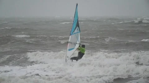 Wind surfers make most of blustery conditions as Storm Franklin is set to strik Vídeos de archivo 170654069