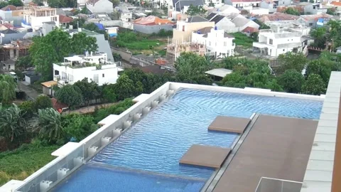 Wind-swept swimming pool wave pattern Stock Footage 229870922