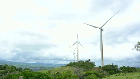 Wind towers generating clean electricity on a cloudy day in Tilaran, Costa Rica. Stock Footage 155416005