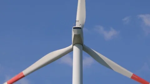 Wind tubines against blue sky Stock Footage