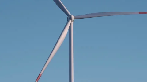 Wind Turbine Against Clear Blue Sky Stock Footage 282926087