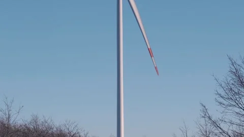 Wind Turbine Against Clear Blue Sky Stock Footage 282926141
