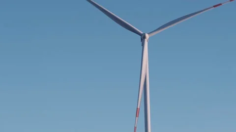 Wind Turbine Against Clear Blue Sky Stock Footage 282926203