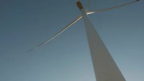 Wind Turbine Against Clear Blue Sky Stock Footage 282927367