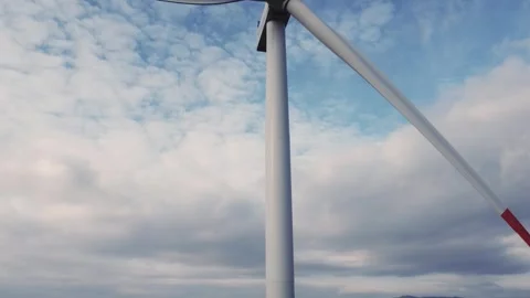 Wind Turbine Against a Cloudy Sky Stock Footage 282927082
