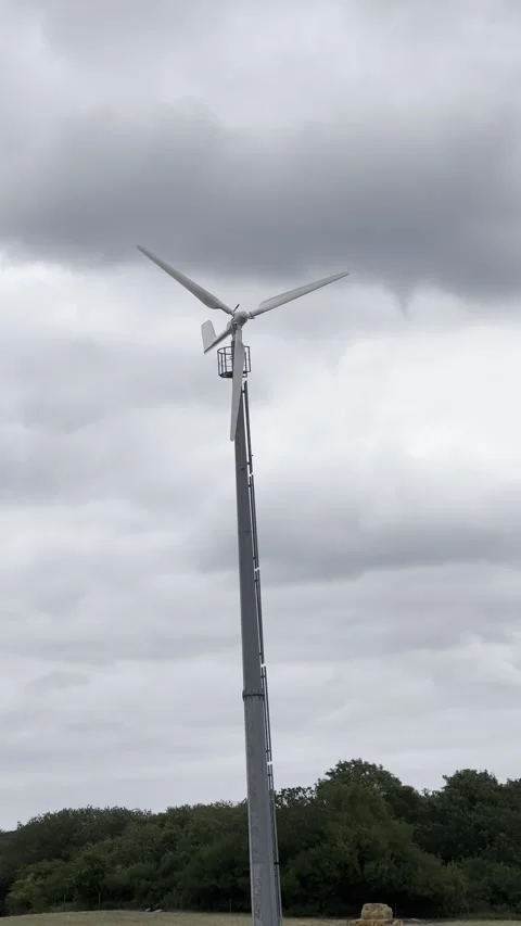Wind Turbine Against Cloudy Sky Video stock 340479251