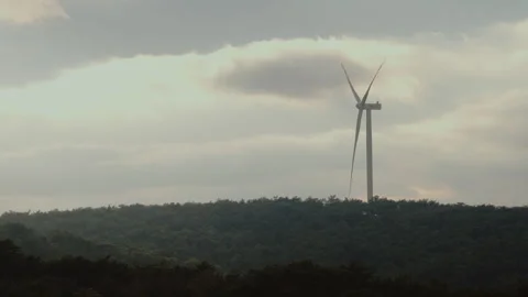 Wind Turbine Among Forested Hills Stock Footage 282925856