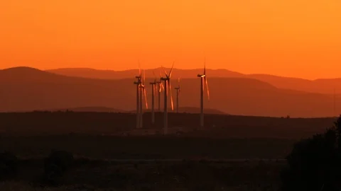 Wind turbine and clean wind energy dusk Stock Footage 114233767