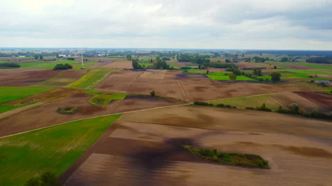 Wind turbine and fields, landscape Stock Footage 217686373