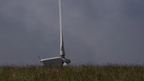 Wind Turbine and grass with clouds moving fast 4K Video stock 92213312