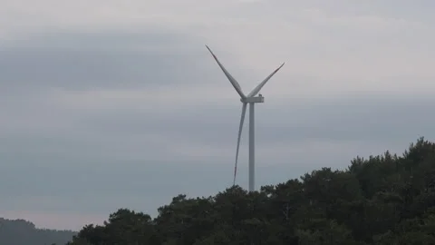 Wind Turbine and Overcast Sky Stock Footage 282933636