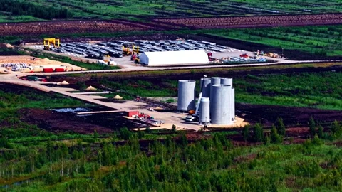 Wind turbine bases during construction phase rural Latvia Aerial Stock-Footage 330868462