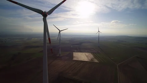 Wind turbine from behind with nice sun set Stock Footage 93190963
