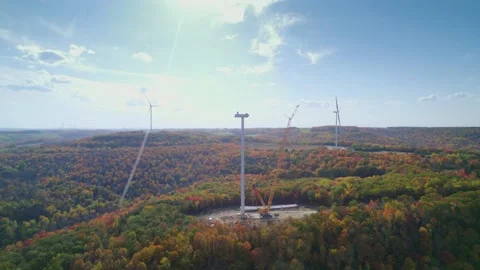 The Wind turbine is being repaired by constructions in Mountain. Stock Footage 226498764