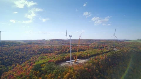The Wind turbine is being repaired by constructions in Mountain. Stock Footage 226498778