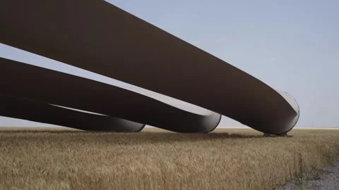Wind turbine blades ready to be installed on a windmill Stock Footage 313465523