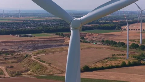 Wind turbine blades rotating generating renewable energy 動画素材 342810787