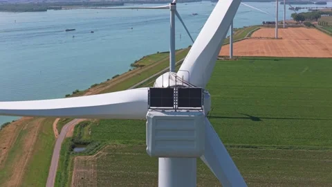 Wind turbine blades rotating for renewable energy production Stock Footage 342809629