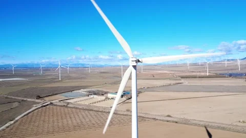 Wind turbine blades spinning generating clean energy Stock Footage 327550147