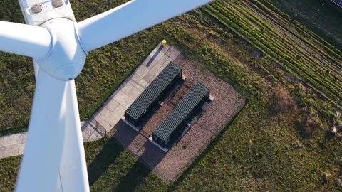 Wind turbine blades spinning generating sustainable energy Video stock 333567176