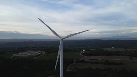 Wind turbine blades spinning in the wind Stock Footage 327125628