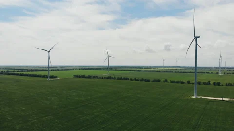 Wind turbine with blue sky and grass field. Stock Footage 159268591