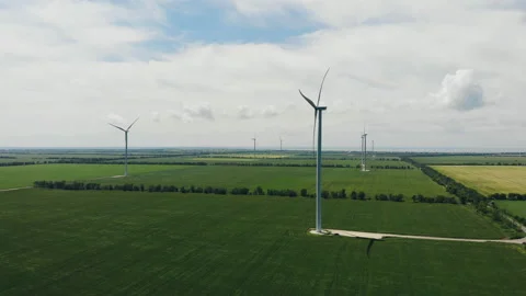 Wind turbine with blue sky and grass field. Stock Footage 161620766