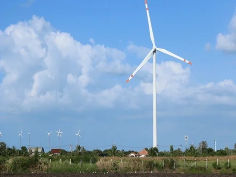 Wind turbine on blue sky background Stock Footage 73720147