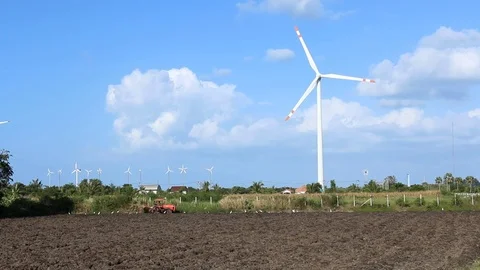 Wind turbine on blue sky background Stock Footage 73720426