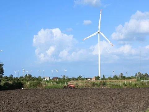 Wind turbine on blue sky background Stock Footage 73720561