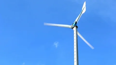 Wind turbine on blue sky background Stock-Footage 73722209