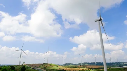 Wind turbine with blue sky background, wind energy. 4K Timelapse Stock Footage 82235620