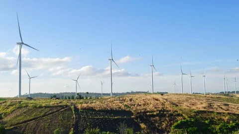 Wind turbine with blue sky background, wind energy. 4k timelapse Stock Footage 84477421