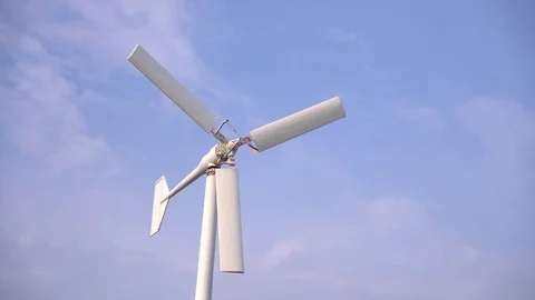 Wind turbine with blue sky background Stock Footage 107951271
