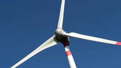Wind turbine on blue sky Stock Footage 81177598