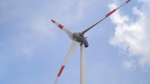 Wind turbine in blue sky Stock Footage 93341337