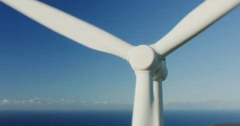 Wind turbine in a blue sky Stock Footage 118470354