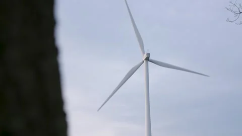 Wind Turbine with blue sky Stock Footage 240732635