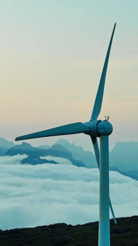 Wind turbine close-up above cloud layer in Madeira Stock Footage 340078714