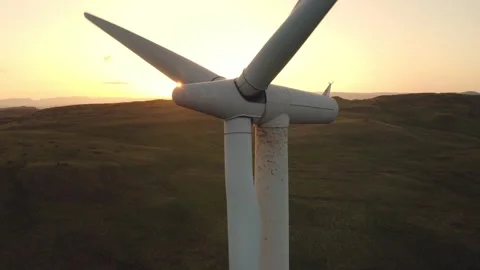 Wind turbine close-up at sunset. Renewable energy conceptual. Stock Footage 157323112