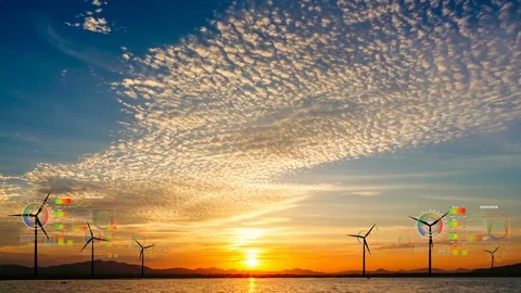 Wind turbine with cloud sky time lapse in sun set. Stock Footage 113801058