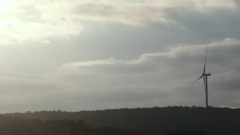 Wind Turbine on a Cloudy Horizon Stock Footage 282928028